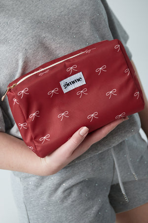 Toiletry bag bows