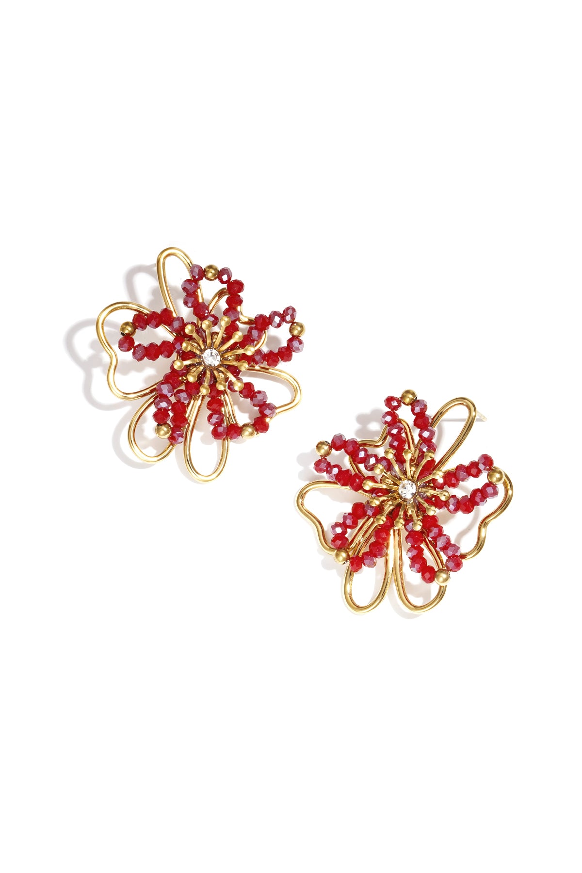 Goudkleurige bloem stud oorbellen met oranje kristal accenten