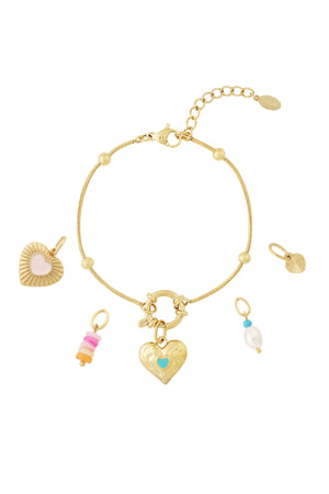 Gouden charm armband set met hart hanger en verschillende verwisselbare charmes