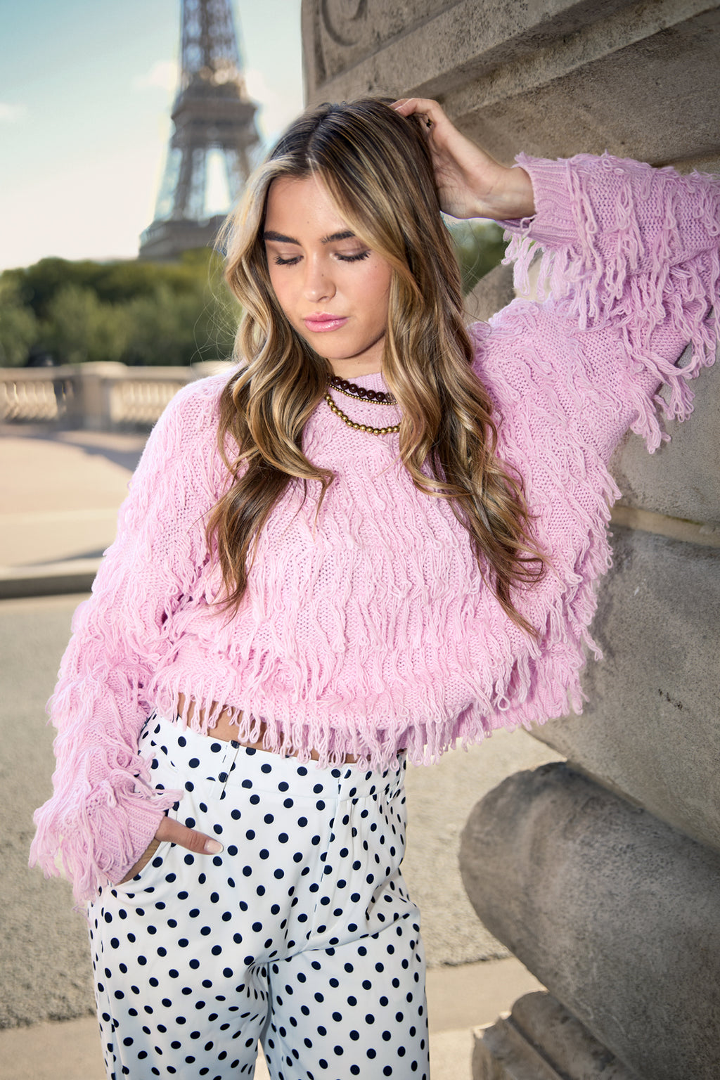 Knitted sweater with fringes