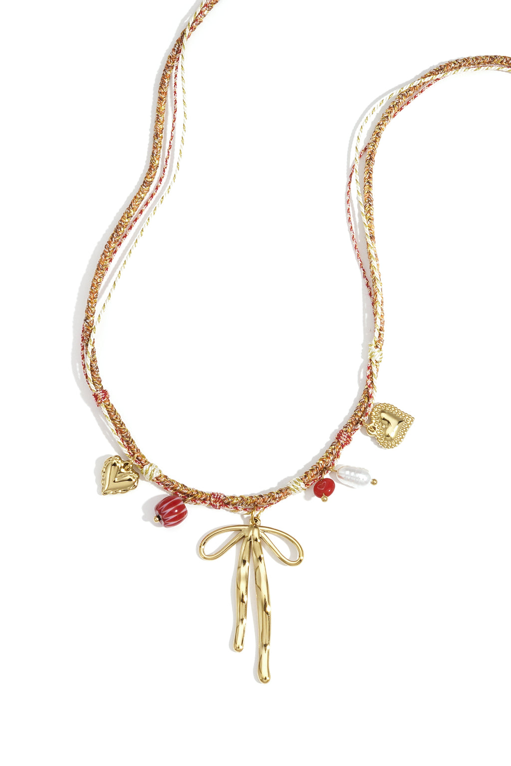 Goudkleurige ketting met strik charm en hangende druppel bedels