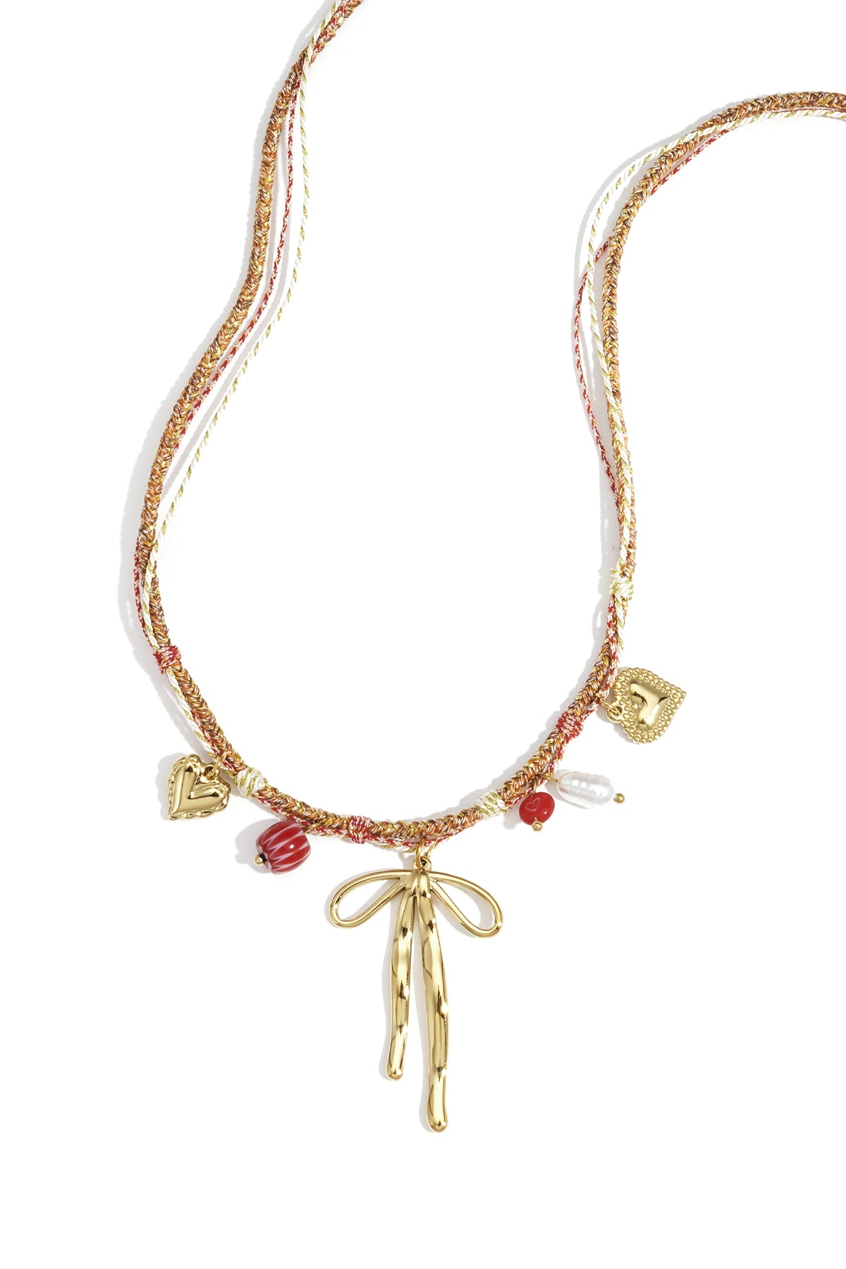 Goudkleurige ketting met strik charm en hangende druppel bedels
