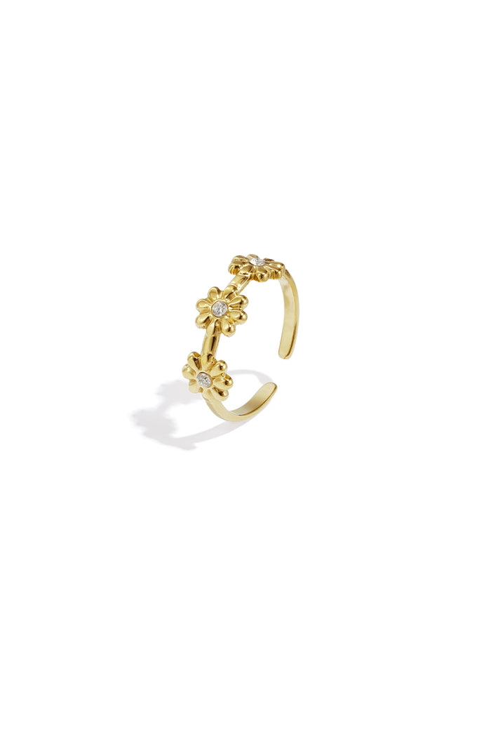 Goudkleurige verstelbare ring met drie kleine bloemen en kristalen
