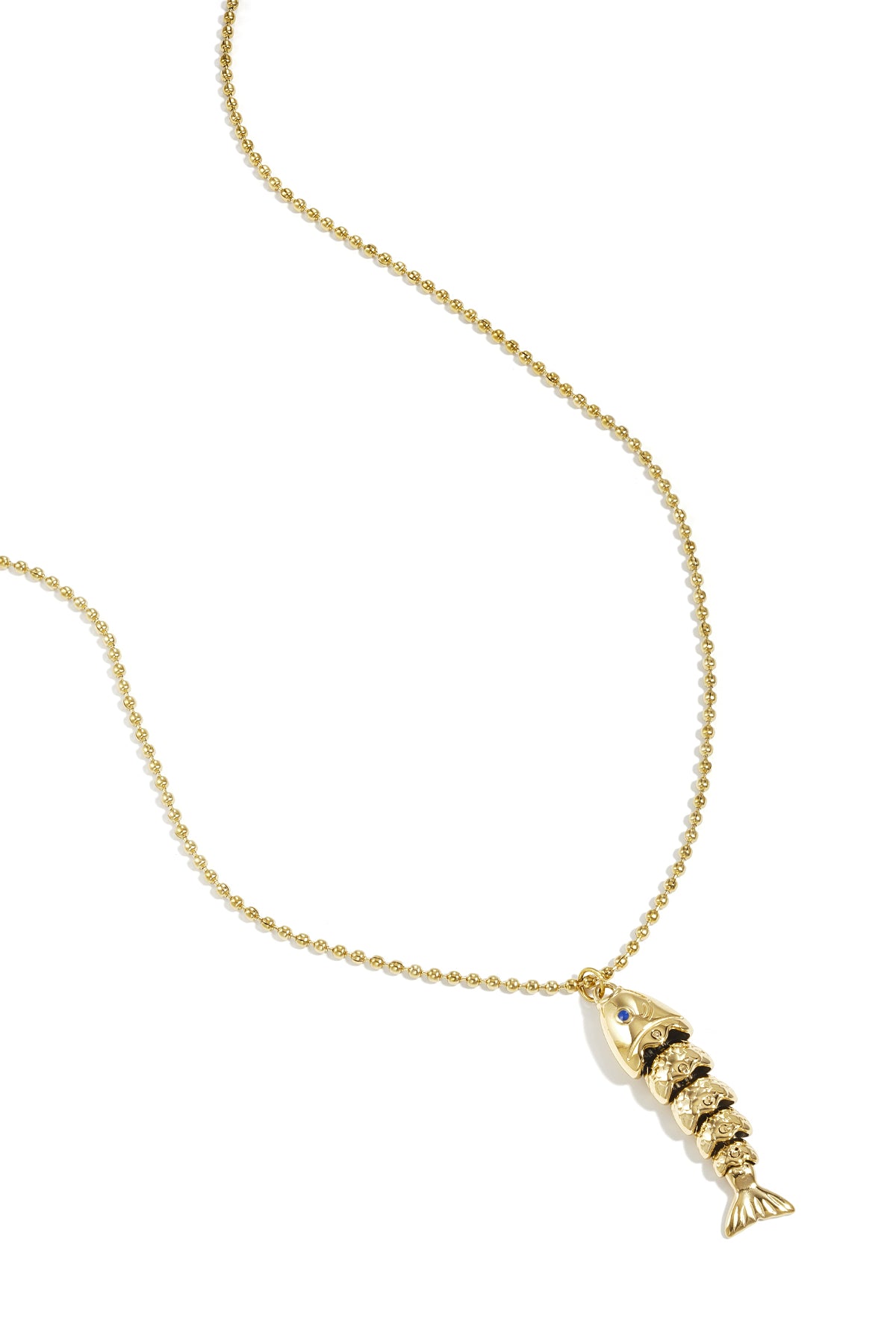 Goudkleurige ketting met beweegbare vis charm van geel en zwart emaille