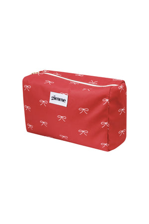 Rode polyester toilettas met wit strikjespatroon en Gimme label