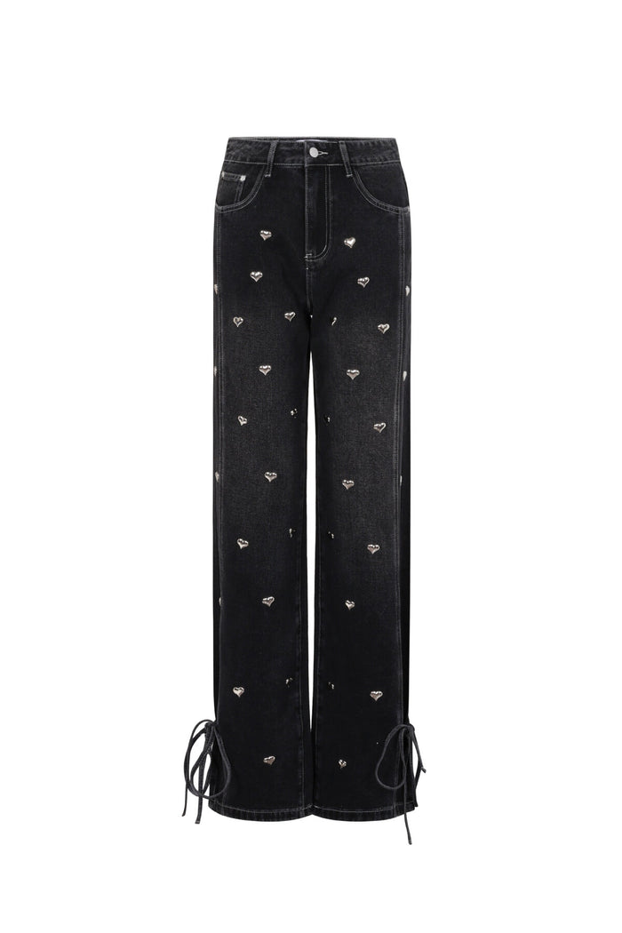 Zwarte straight leg jeans met wit hartjes patroon en gevlochten details