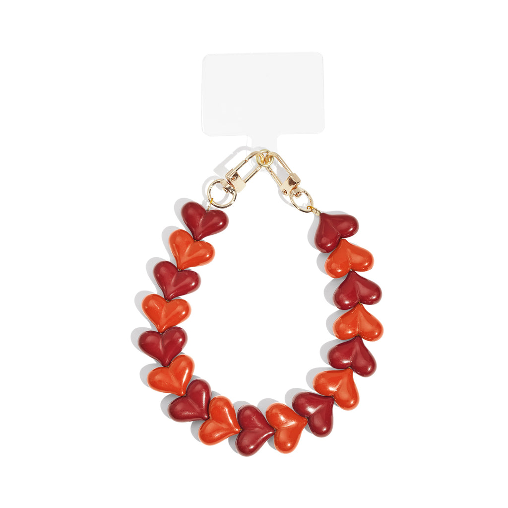 Telefoonketting met rode en oranje hart kralen van acryl