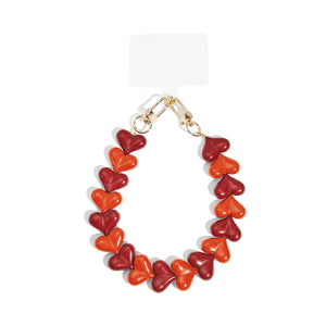 Telefoonketting met rode en oranje hart kralen van acryl