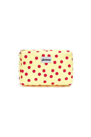 Geel make-up tasje met rode stippen en ritssluiting