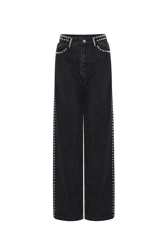 Zwarte rechte jeans met metalen studs langs de zijnaden en zakken